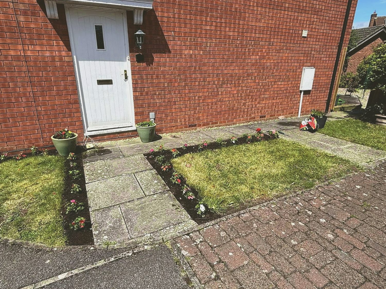 A tidy front garden after local garden work