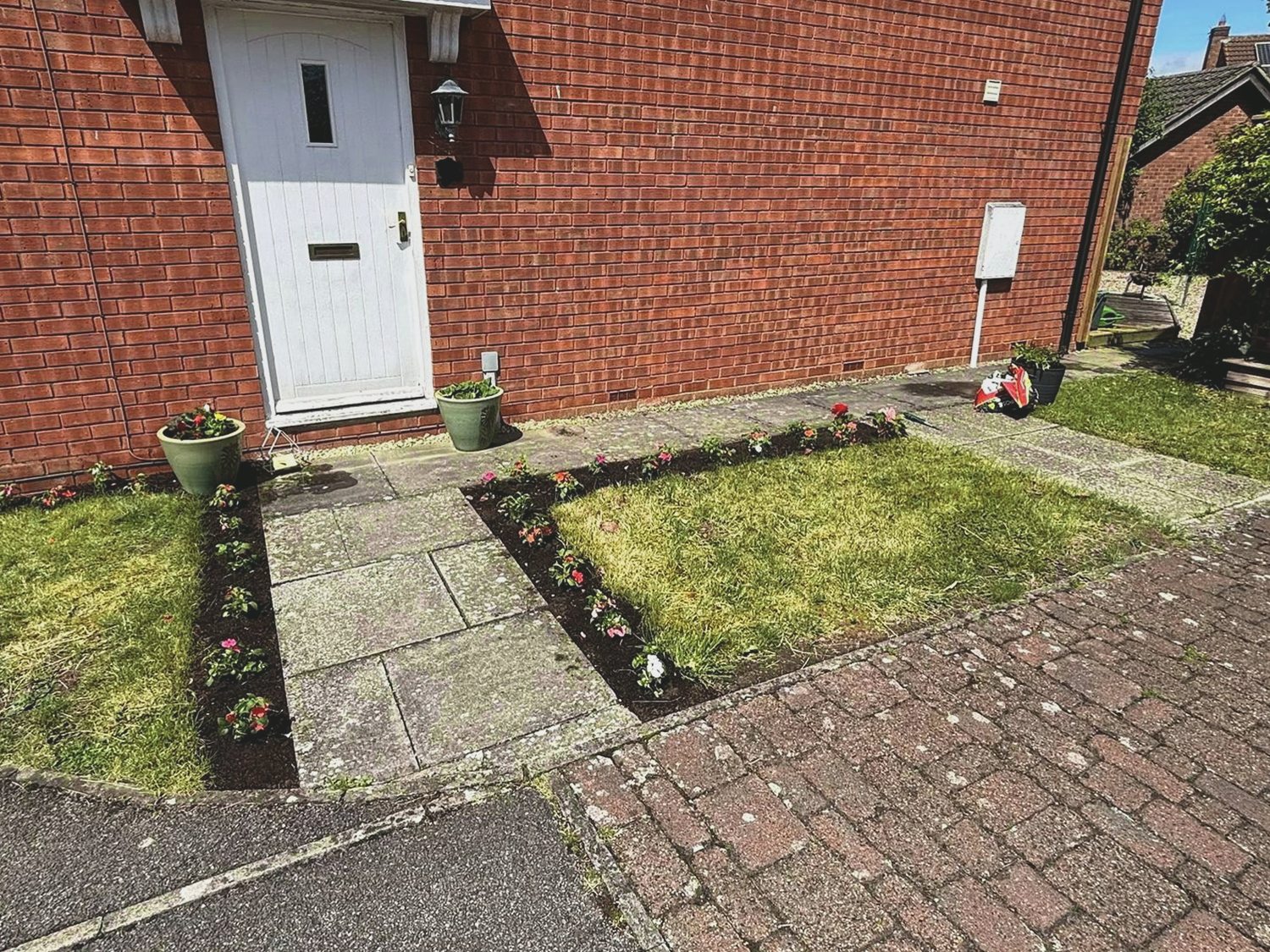 A tidy front garden after local garden work